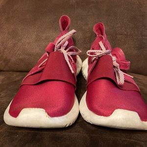 Pinkish Adidas tennis shoes